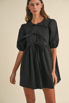 Put your best foot forward in our Poplin Front Bow Tie Mini Dress! This short puff sleeve cotton dress features a self-tie detail and a lining for added comfort. Perfect for any occasion, this mini dress is a cute and adorable addition to your wardrobe. Get your babydoll dress game on point with this charming outfit! Billowy Sleeve Dress, Casual Cottagecore, Fit Checks, Church Fits, Fall Closet, Cottagecore Outfits, Short Puff Sleeve, Fall Fit, Tie Front Dress