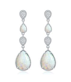 PRICES MAY VARY. Opal & Moissanite :Using beautiful opal and moissanite stone,smooth and sparkly, combined with exquisite hemming technology, to create a gorgeous and delicate gemstone earrings 925 Sterling Silver:Made of solid 925 sterling silver, the outer layer plated with white gold to ensure the comfort of wearing 。The dainty silhouette complements the oval shape of the gemstone, and the vintage vibe adds style to your everyday look. Amazing Gift for Her:Come with our dark green delicate gi Blue Stones Jewelry, Pink Opal Earrings, White Opal Earrings, Larimar Earrings, Opal Drop Earrings, Synthetic Opal, Moissanite Earrings, Green Jewelry, Earring Jewelry