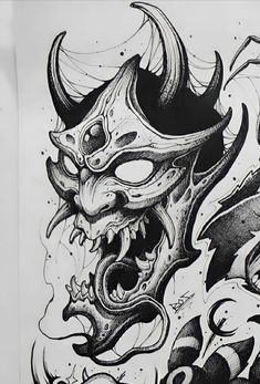 a black and white drawing of a demon mask