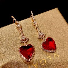 Haute Garnet And Clear Cz Halo Heart Dangle Earrings Triple 18k Gold Finish Light Weight Beautiful Sparkling Dangle Earrings Red Quince Jewelry, Red Heart-shaped Cubic Zirconia Earrings, Valentine's Day Heart Drop Earrings With Cubic Zirconia, Red Heart-shaped Earrings For Formal Occasion, Valentine's Day Cubic Zirconia Dangle Heart Earrings, Valentine's Day Cubic Zirconia Heart Dangle Earrings, Valentine's Day Cubic Zirconia Drop Earrings, Valentine's Day Cubic Zirconia Earrings, Valentine's Day Formal Heart Dangle Earrings