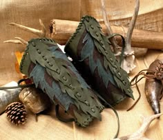 Forest leaves vambraces-pair, made in couple of shades of green real leather. You can use them for different costumes. PRICE IS FOR THE PAIR!  << COLOR MAY VARY SLIGHTLY DUE TO THE COLORS OF EACH INDIVIDUAL MONITOR! > Forest Elf Costume, Medieval Fantasy Costume, Park Ranger Aesthetic, Armor Craft, Dnd Gnome, Hobbit Characters, Dryad Costume, Ranger Aesthetic, Dnd Clothing