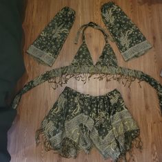 Best fits: - cup size: A-C - skirt: waist 27 - 36 inch (DM for other sizes) - shortest part of skirt: 8 inches long - longest part of skirt: 17 inches long This set includes: crop top, sleeves, hood, and fairy skirt Handmade by me <3 Made to Order, ready to ship in 3-5 weeks DM for other colors! If you're interested in a different style top or skirt, or want to add sleeves or a garter! #handmade #fae #festival #fairy #rave Pashima Scarf Rave, Mushroom Fairy Rave Outfit, Rave Fits Casual, Bohemian Halter Top For Party, Bohemian Halter Top For Beach Party, Fitted Bohemian Halter Top For Party, Bohemian Fitted Festival Sets, Bohemian Fitted Party Sets, Fitted Bohemian Party Sets