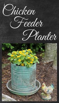 a metal bucket filled with yellow flowers next to a tree and a bird figurine