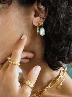 Elevate your everyday styling with these gold textured hoops. Secured with a clasp fastening, these light and easy to wear hoop earrings feature a unique twist detail for added artisan character. Twist Hoop Earrings, Stacked Earrings, Pierced Jewelry, Sustainable Jewelry, Hand Jewelry, Recycled Sterling Silver, Gold Hoops, Pearl Drop Earrings, Pearl Drop