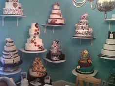 a room filled with lots of different types of cakes