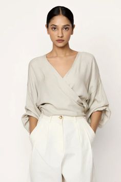 V-neck Wrap Blouse - Natural – LAUDE the Label Boyfriend Trousers, Sustainable Knitwear, Rains Long Jacket, Broad Shoulders, Denim Hat, Day To Night, Neck Wrap, Wrap Blouse, To Night