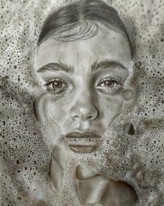 a drawing of a woman's face with bubbles on the surface behind her and water droplets all around her