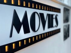 there is a sign that says movies on it