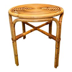 a small round table made out of bamboo