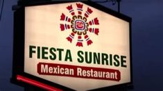 the sign for fiesta sunrise mexican restaurant is lit up in red, white and green