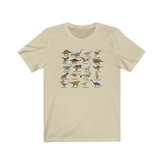 "Who doesn't love dinosaurs?  We have taken twenty of the most dominating dinosaurs we could find and called them out on this shirt for you: stegosaurus, diplodocus, ichthyosaurus, troodon, velociraptor, ankylosaurus, pteradactyl, triceratops, dreadnoughtus, pachycephalosaurus, brachiosaurus, spinosaurus, tyrannosaurus rex, archaeopteryx, deinonychus, therizinosaurus, dilophosaur, parasauralophus, compsognathus, and last but not least, an elasmosaurus. Wear this shirt and show all of your friend Cheap White T-shirt With Dinosaur Print, Cheap Dinosaur Print Long Sleeve T-shirt, Dinosaur Tshirt For Women, Cheap Cute Tops With Dinosaur Print, Cheap Casual Tops With Dinosaur Print, Cheap Relaxed Fit T-shirt With Dinosaur Print, Cute Cheap Tops With Dinosaur Print, Cheap Green T-shirt With Dinosaur Print, Cute Cheap Dinosaur Print Tops