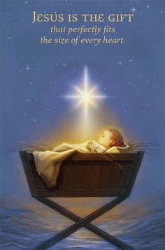 a baby jesus is laying in the manger with his star on top of him