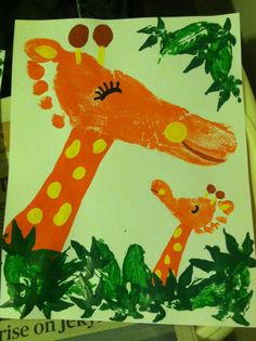 a child's drawing of a giraffe with leaves on it