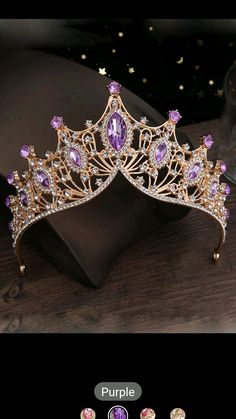 a tiara with purple stones on it and the words purple written in white letters