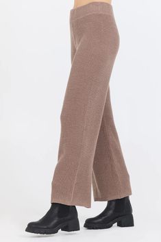 Experience stylish comfort with our Heather Brown Waffle Knit Flared Pants! Made from a soft, breathable knit fabric, these pants are perfect for a casual day out or a cozy night in. The flared design adds a touch of elegance and versatility to your wardrobe. *Our model is 5'9" Trendy Wide Leg Pants For Winter Loungewear, Elegant Beige Knit Bottoms, Cozy Wide Leg Pants For Fall Loungewear, Comfortable Fall Workwear Pants, Comfortable Workwear Pants For Fall, Elegant Knit Bottoms For Winter, Beige Knit Pants For Fall, Winter Comfortable Ribbed Pants, Comfortable Ribbed Winter Pants