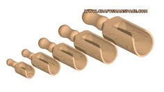 four wooden pegs are lined up in a row