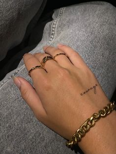 courage tattoo black font Mom Ideas Tattoo, Small Hand Tattoos For Women Words, Small Tatts For Woman, Self Love Quote Tattoo, Courage Hand Tattoo, Strength Hand Tattoo, One Word Hand Tattoos, Worthy Hand Tattoo, Arm Tattoo Women Aesthetic