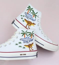 Embroidery converse/Custom Embroidered dinosaur shoes/Custom converse high tops embroidered dinosaur/gift birthday shoes/Personalized name   💸 Price includes Converse Shoes and floral embroidery as shown 🌸 You can send me your Converse/Vans shoes or I can buy them for you. We stock all the Converse and Vans shoes you want, if you want other Converse/Vans shoes in the store, please message us. Your embroidered Converse/Vans shoes will be available for shipping in 7-15 days. 🌸 I started hand embroidering on fashionable clothes and handbags over 20 years ago - and now on CONVERSE/VANS shoes, an American icon, a must-see classic! I'm excited to give your Chuck Taylor shoes a new look with beautiful, nature-inspired embroidery. All images, designs and text used by CUSTOMSHOEDESIGNSOHO are co Custom Converse High Tops, Embroidered Dinosaur, Embroidery Converse, Converse Chuck 70s, Dinosaur Shoes, Painted Converse, Birthday Shoes, Converse Fits, Chuck Taylor Shoes