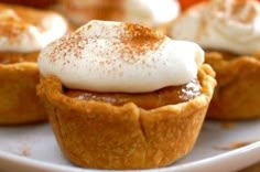 small desserts are sitting on a white plate