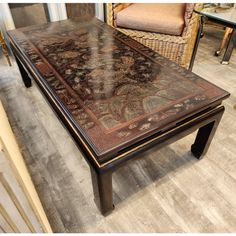 a coffee table with an intricate design on it