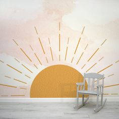 a rocking chair sitting in front of a wall with the sun shining down on it