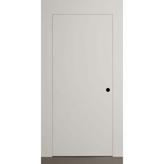 a white door with black knobs on the front and side panels, in an empty room