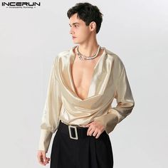 SPECIFICATIONSBrand Name: INCERUNMaterial: POLYESTERShirts Type: Casual ShirtsApplicable Scene: BANQUETStyle: CasualOrigin: Mainland ChinaCN: GuangdongSleeve Length(cm): FullApplicable Season: Spring and AutumnGender: MENItem Type: SHIRTSPlace Of Origin: China (mainland)Collar: V-NeckClosure Type: noneSleeve Style: regularModel Number: Men Solid Color Casual ShirtFabric Type: BroadclothPattern Type: SolidColor: Black,BeigeSize: S,M,L,XL,2XL,3XL,4XL,5XL,Plus SizeType: V Neck Long Sleeve Men ClothingStyle: Camisa MasculinaWholesale,Dropshipping: WelcomeFabric Material: 100%PolyesterChoice: yessemi_Choice: yes {custom} Size:S,M,L,XL,2XL,3XL,4XL,5XLFabric Material:100%PolyesterColor:Black,BeigeOccasion:LeisurePattern:Solid colorProduct Description:Men's Satin Long Sleeve ShirtsModel Size:M Men’s Blouse, Graduation Hacks, Feminine Men Fashion, Kibbe Romantic, Cowl Neck Shirt, Character Fashion, Clothing Reference, Gay Outfit, Crop Pullover