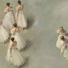 several ballet dancers in white tutus and bows are shown from above, looking down at the floor