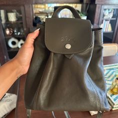 Olive Color. All Leather. Well Taken Care Of. Adjustable Straps. Longchamp Cuir Backpack, Green Longchamp, Longchamp Backpack Le Pliage, Longchamp Le Foulonne Backpack, Longchamp Leather, Longchamp Le Pilage Backpack, Longchamp Bags, Olive Color, Mini Backpack