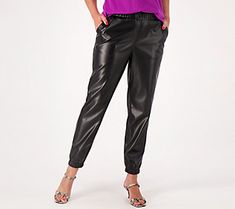 Look stylish and stunning when you don this pair of faux leather joggers. Team them with a bright, beautiful blouse and some leather pumps for an evening out on the town. From LOGO by Lori Goldstein®. Faux Leather Joggers, Leather Jogger Pants, Leather Joggers, Lori Goldstein, Petite Pants, Athletic Apparel, Look Stylish, Beautiful Blouses, Leather Pumps