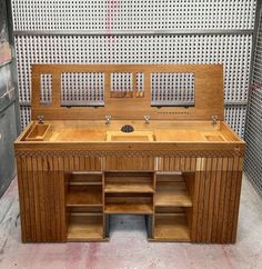 a large wooden vanity with two sinks in it