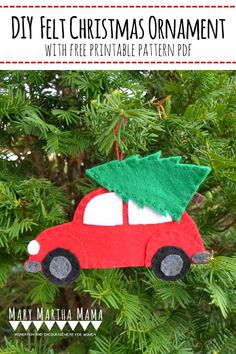 a christmas ornament with a red car and a green tree on the top