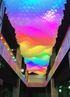 a large multicolored ceiling in a building