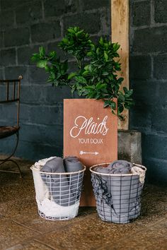 two planters sitting next to each other on a table