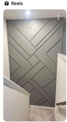 a white refrigerator freezer sitting inside of a kitchen next to a wall painted gray