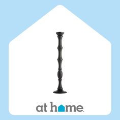 the logo for athome is shown in front of a house with a light blue background