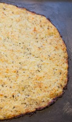 an uncooked pizza sitting on top of a pan