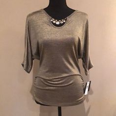 Jeweled Neck Open Arm Blouse. Shimmer Golden Pewter Material. Gathered On Sides. Nwt. Chic Gold Short Sleeve Blouse, Elegant Stretch Gold Top, Elegant Gold Stretch Top, Gold Fitted Casual Blouse, Gold Tops For Night Out In Spring, Chic Gold Stretch Top, Gold Blouse For Night Out, Gold Short Sleeve Tops For Fall, Gold Stretch Blouse For Fall