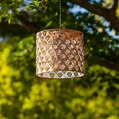 {"Reminiscent of “Tin Art” in a punched luminaria, and made of incredibly durable Tyvek material, the Soji™ Stella solar lantern is a beautiful and unique way to dress up outdoor spaces. The metallic fabric of the Stella Drum shines brilliantly during the day and a high-powered duel LED emits captivating patterns of light by night. Punched with an intricate chevron pattern, this lantern turns on at dusk to create captivating patterns of light each night. Soji™ Solar Lanterns are equipped with on Water Lights, Lantern Gift, Puerto Rico Art, Aluminum Can Crafts, Solar Lantern, Chevron Fabric, Can Art, Porch Balcony, The Company Store