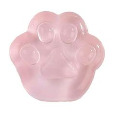 a pink gummy bear shaped object on a white background