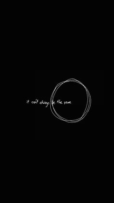 the words are written in white ink on a black background, with a circle drawn across it