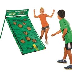 two children are playing with an inflatable game