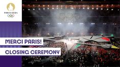 a large group of people standing in front of a stage with the words merci paris closing ceremony