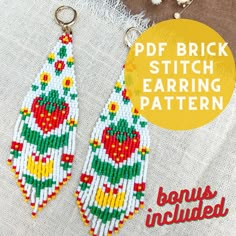 a pair of beaded earrings sitting on top of a table