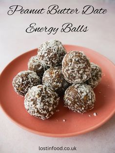 chocolate peanut butter date energy balls on an orange plate