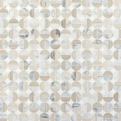 a white and grey tile wallpaper with circles in the shape of small, round shapes