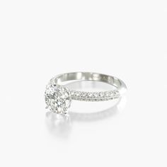 a diamond ring on a white background