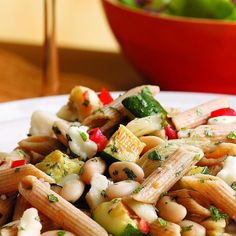 pasta salad with white beans and vegetables on a plate