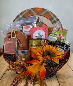 a basket filled with food sitting on top of a wooden table