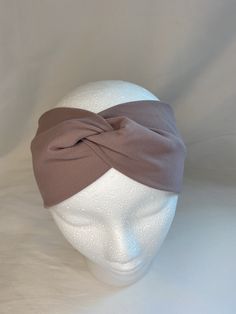 Our twist top headbands are made with fun fabrics sure to make you happy! They are great for work, play, or just wearing around the house. They can be worn multiple ways; with the twist on the top of your head, the back of your head, or folded over for a slimmer headband look. All of our headbands are made of soft, stretchy knit material. The Solid Mauve Double Brushed Knit fabric is 90% Polyester, 10% Spandex. They are approximately 17-19 inches around, and 2-3.5 inches wide. No two headbands a Casual Adjustable Solid Color Headband, Adjustable Purple Headband For Spring, Adjustable Cotton Sweatband Headband, Sporty Headband With Sweatband, One Size, Adjustable Purple Headband, Spring Headband, Twist Top, Stretch Headband, Twist Headband